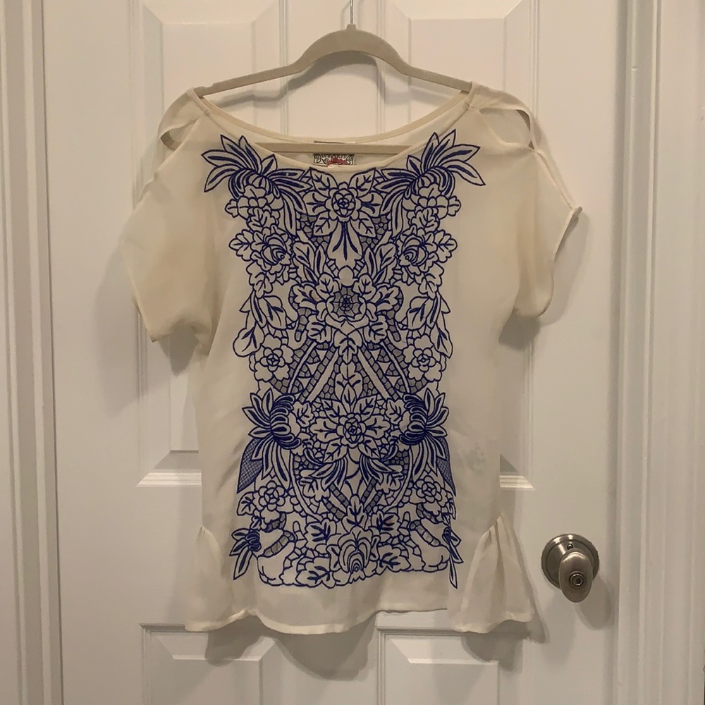A sheer Barashci top from Anthropologie. Size small but it is a loose fit